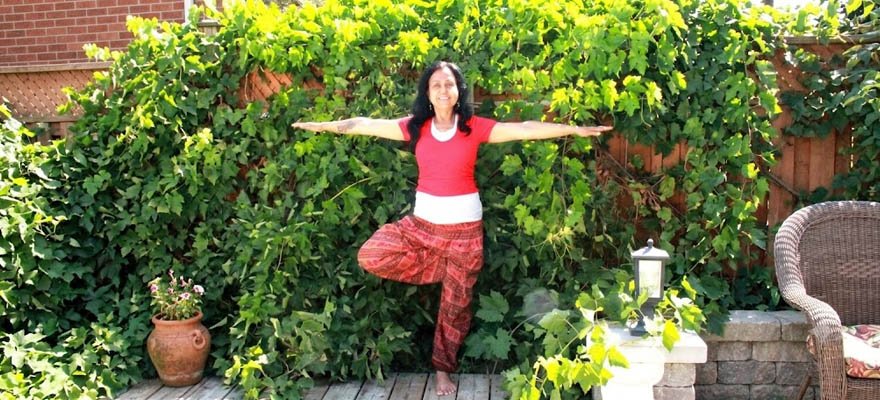 Practicing outdoor yoga amidst nature for stress relief, anxiety reduction, and inner peace
