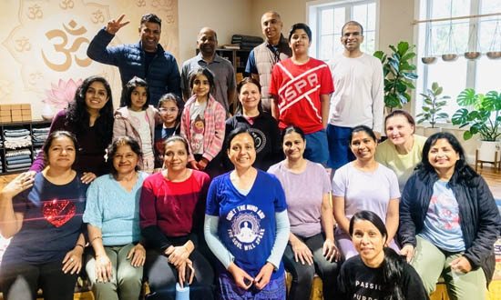 Peaceful group meditation and relaxation practice during a Bay Area yoga session