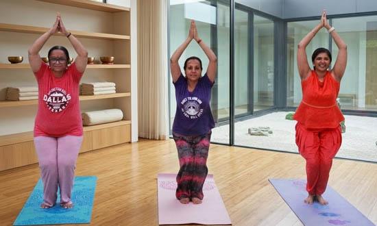 Participants engaged in an intensive mindfulness workshop and deep yoga practice session during a Bay Area retreat