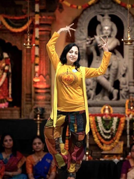 Lead instructor Sushma Srivastava demonstrating specialized yoga stretches for dancer strength and flexibility in the Bay Area